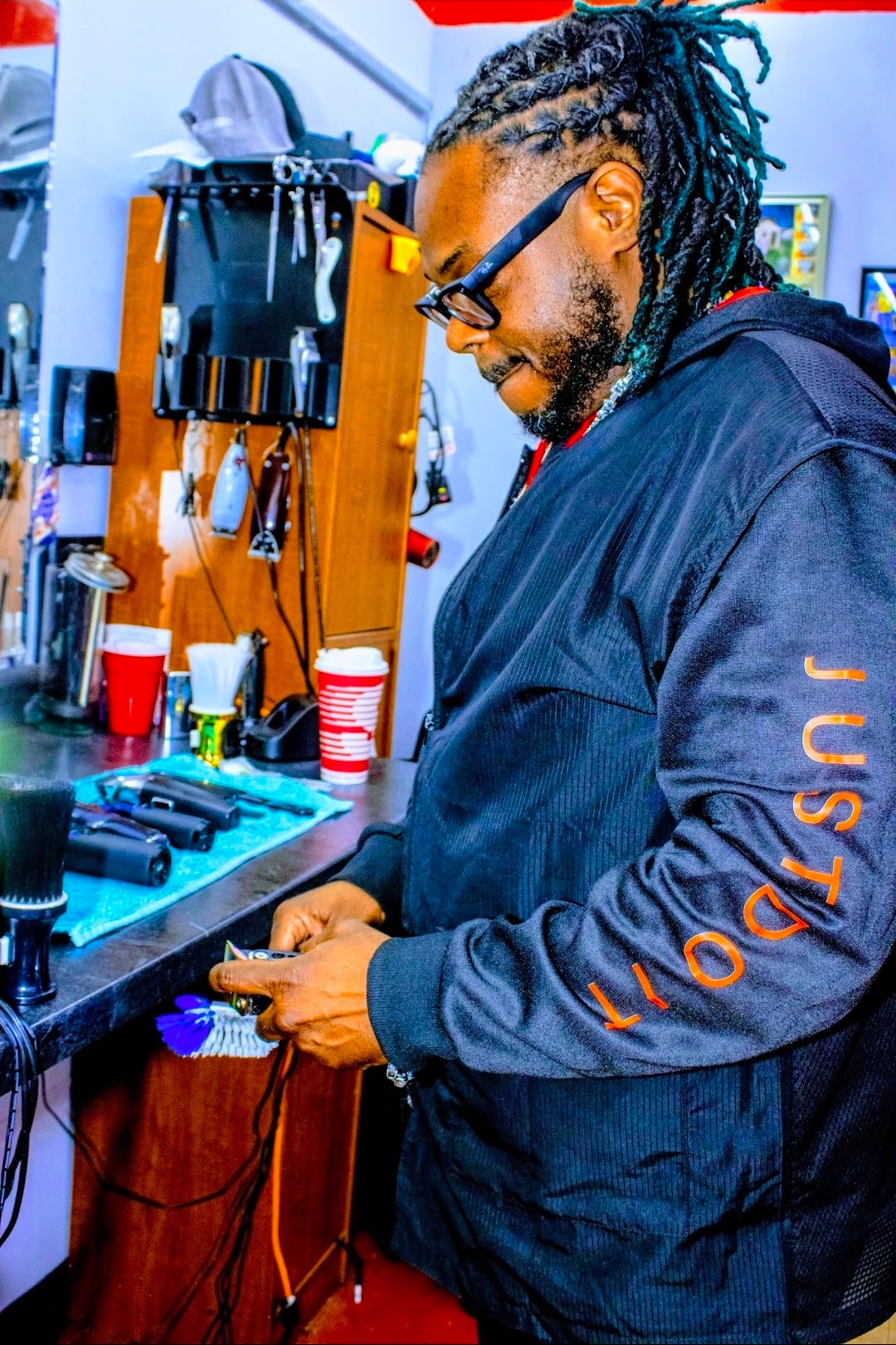 Big Tyme barber at his station in Indianapolis